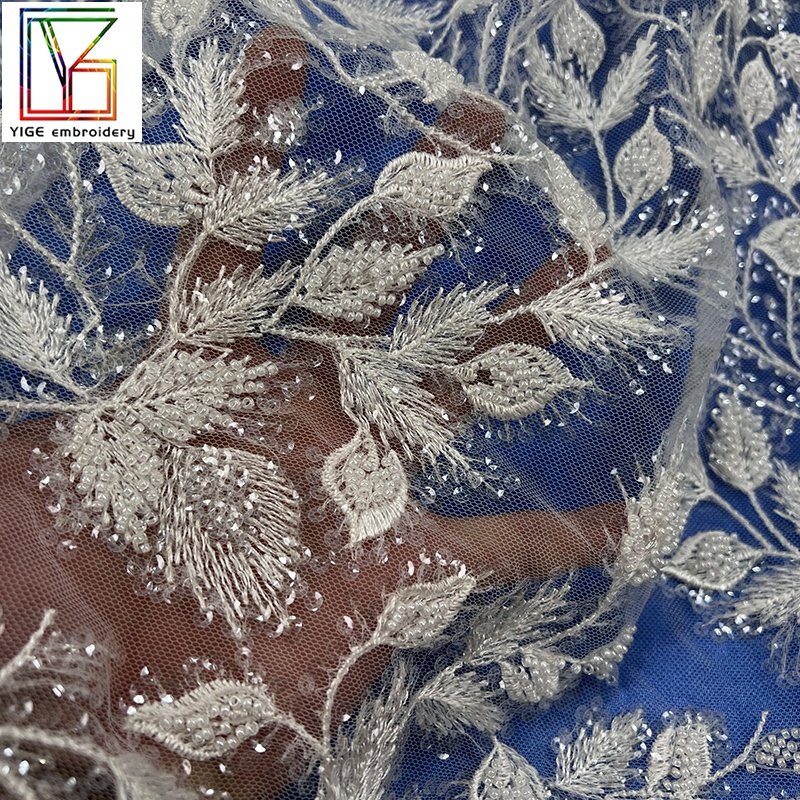 New arrival Luxury heavy French beaded embroidery transparent White sequins mesh bridal lace African women wedding Lace Fabric