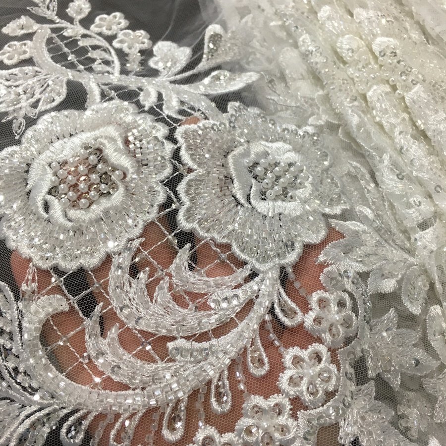 high quality new design bridal lace fabric/very heavy machine beaded embroidery wedding lace fabric for dresses