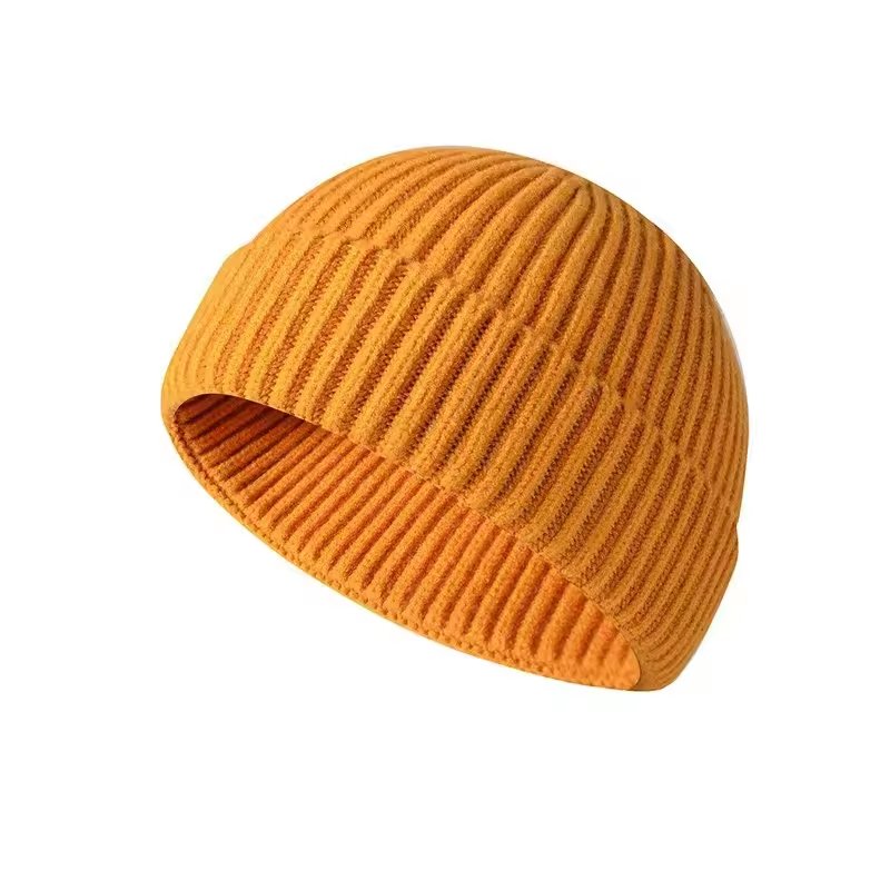 Wholesale windproof Knitted ribbed skull gorras breathable winter warm folded custom beanie logo fur ball caps for women men