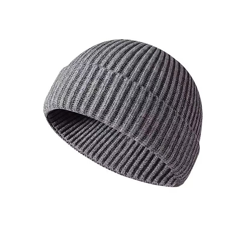Wholesale windproof Knitted ribbed skull gorras breathable winter warm folded custom beanie logo fur ball caps for women men