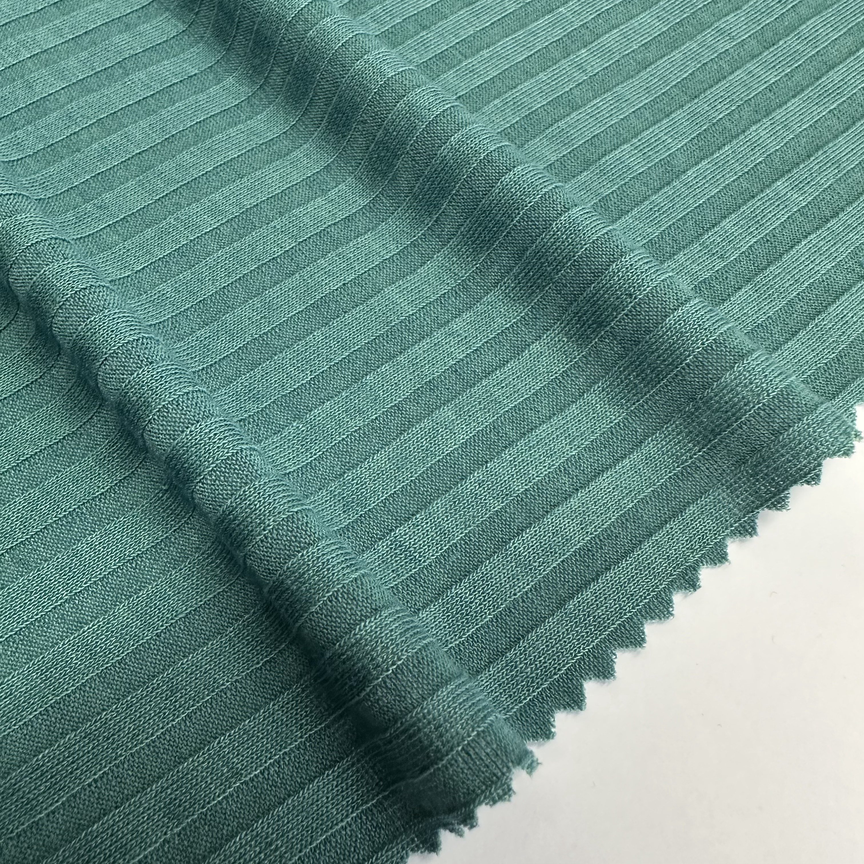 Popular solid colors 94% polyester 6% spandex stretch ribbed fabric 7*2 rib fabric for sweater and clothing