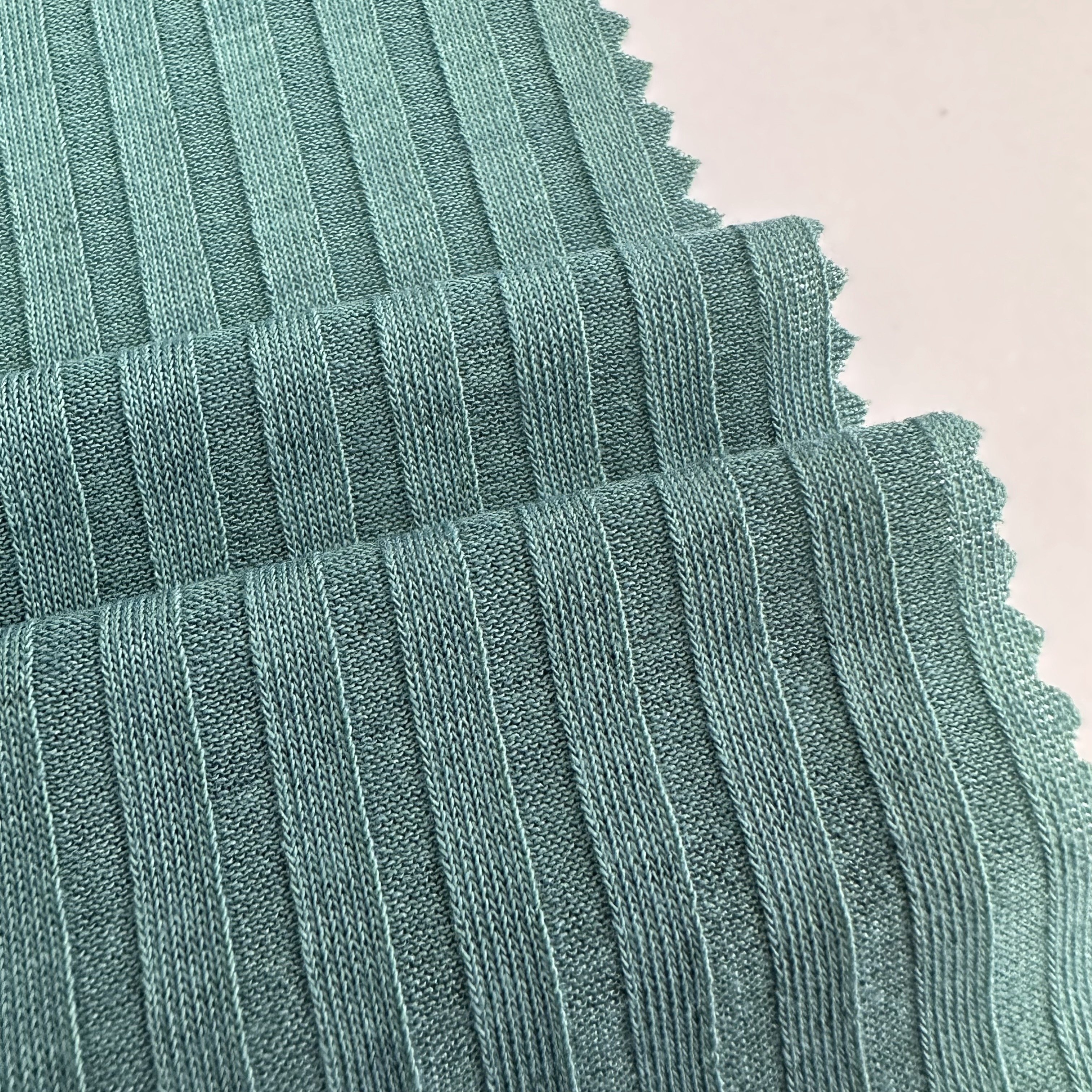 Popular solid colors 94% polyester 6% spandex stretch ribbed fabric 7*2 rib fabric for sweater and clothing
