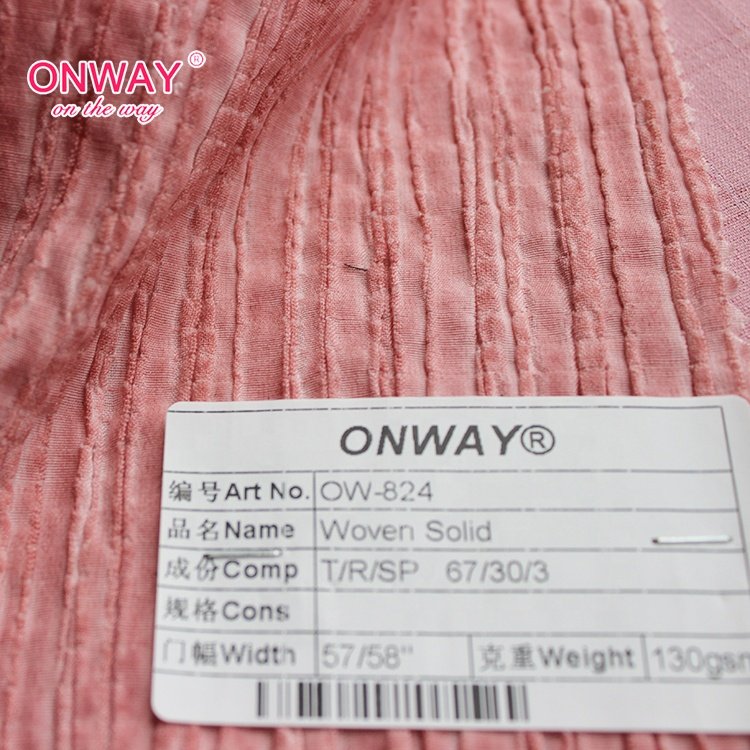Garment textile good hand feeling classic design woven solid 67% tencel fabric wholesale