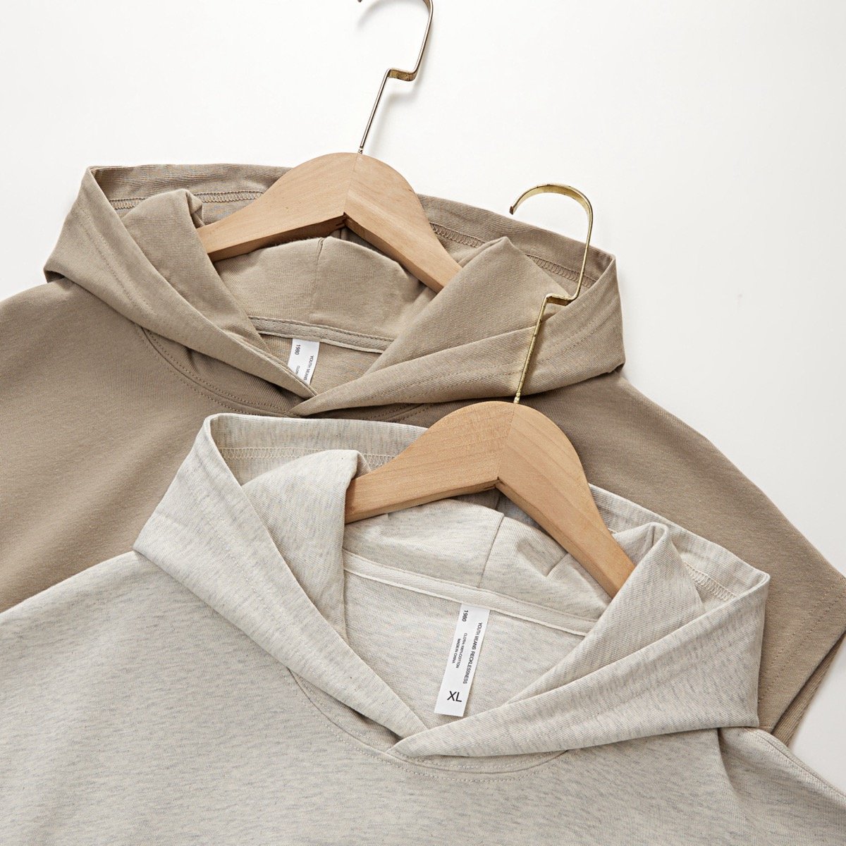 Sleeveless Oversize hoodie with adjustable hood and no sleeves Front pouch pocket Ribbed tank tops