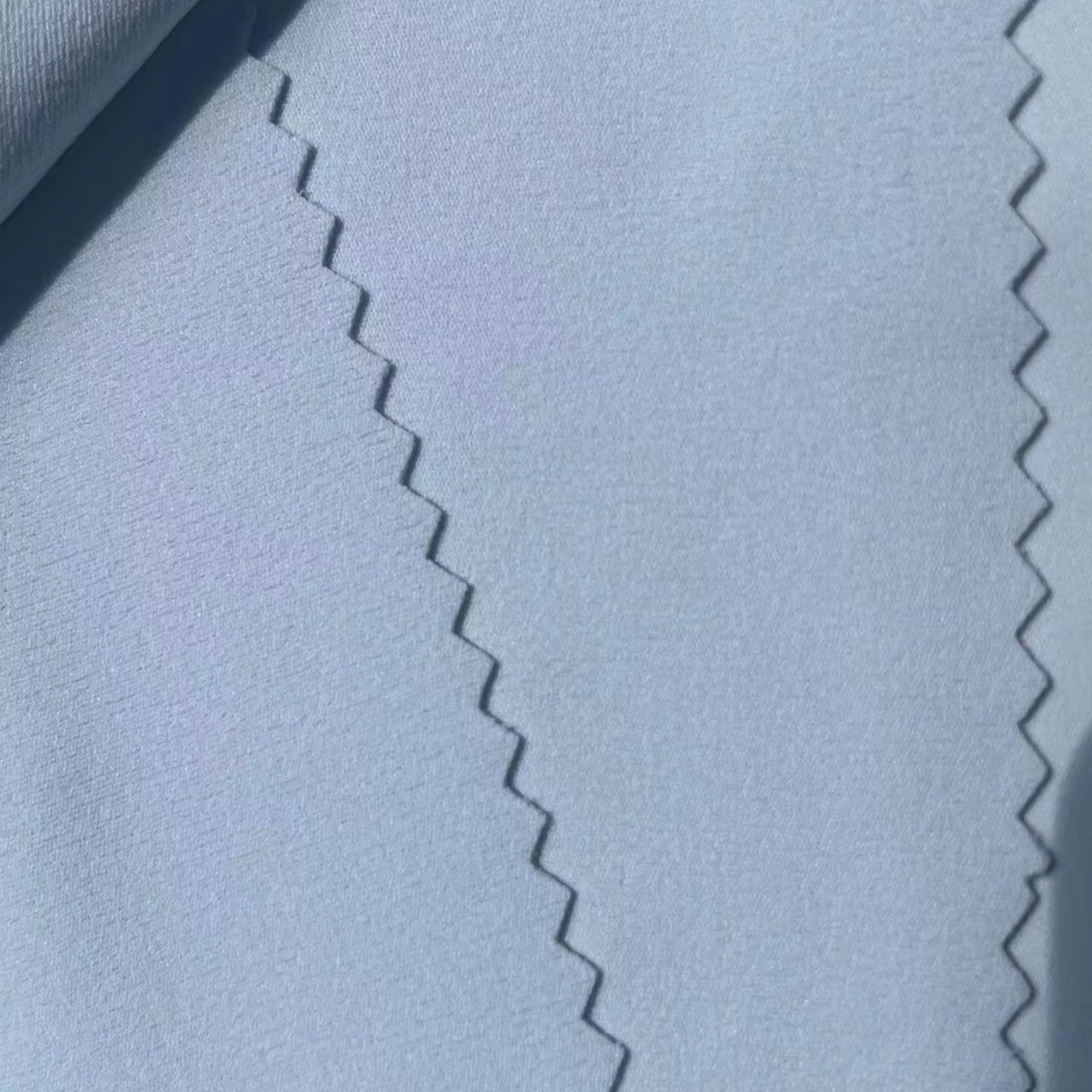 Professional New Ribbed Nylon High Elastic Spandex Fabric Stock Weft Knitted Material For Sportswear