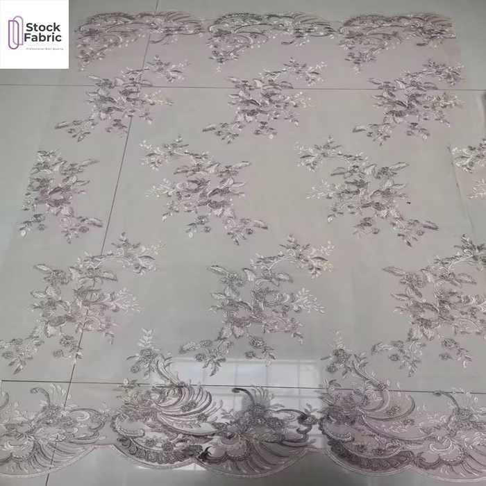 China textile hot selling woven heavy mesh embroidery fabric stock lot for clothing