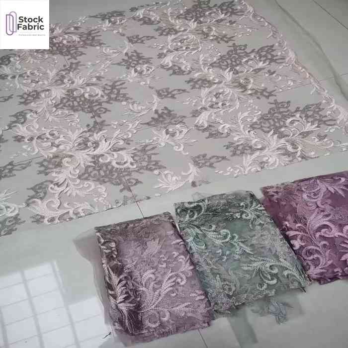 China textile hot selling woven heavy mesh embroidery fabric stock lot for clothing
