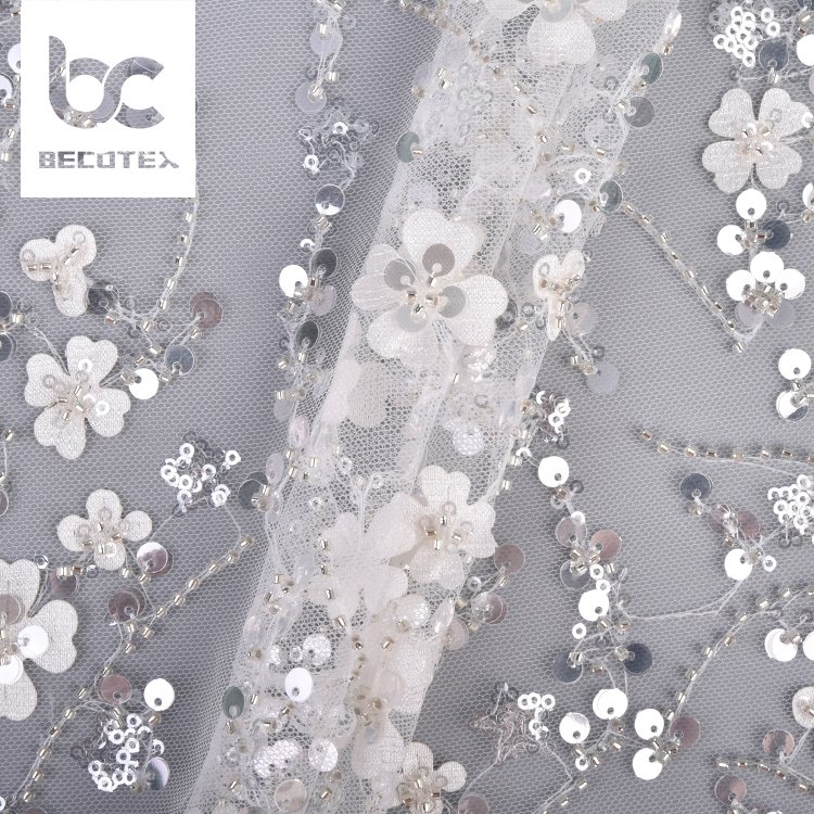 Hot sales competitive price 100% polyester knitted beautiful flower sequin embroidery tulle lace fabric for women dress