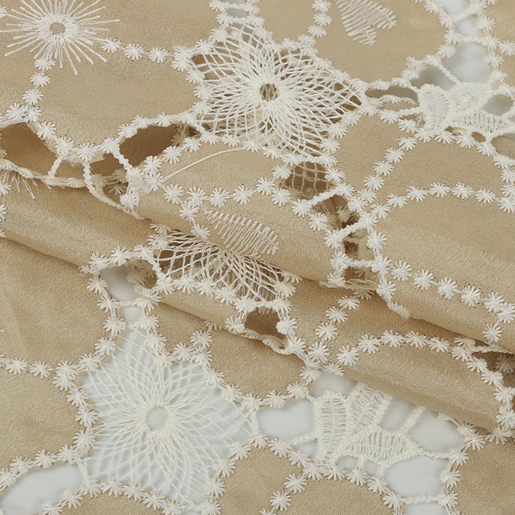 Hot sale popular polyester laser water soluble embroidery fabric embroidery hollow four-leaf clover laser embroidery lace fabric
