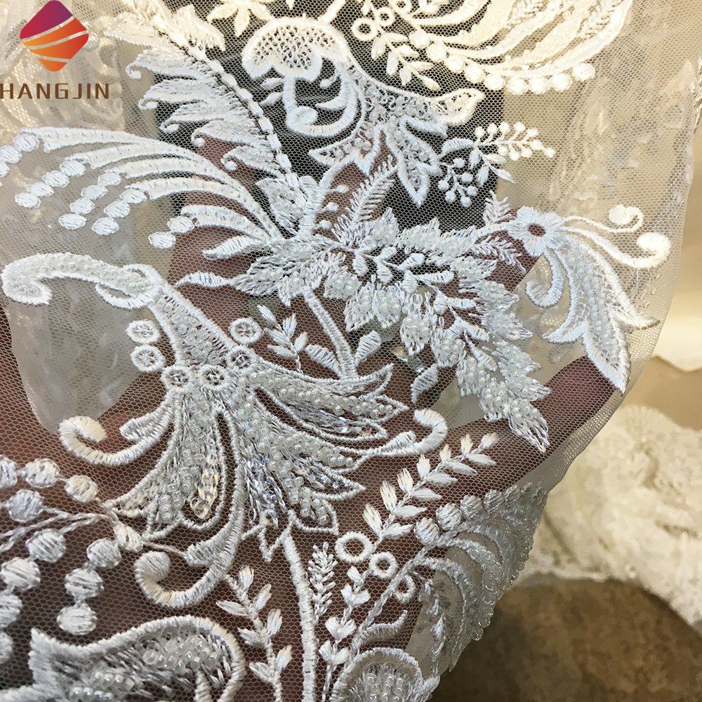 New Arrival Bridal Lace Fabric Luxury Sequin Beaded Guipure Lace Fabric Embroidery Tulle Net Fabric Sell By Yard