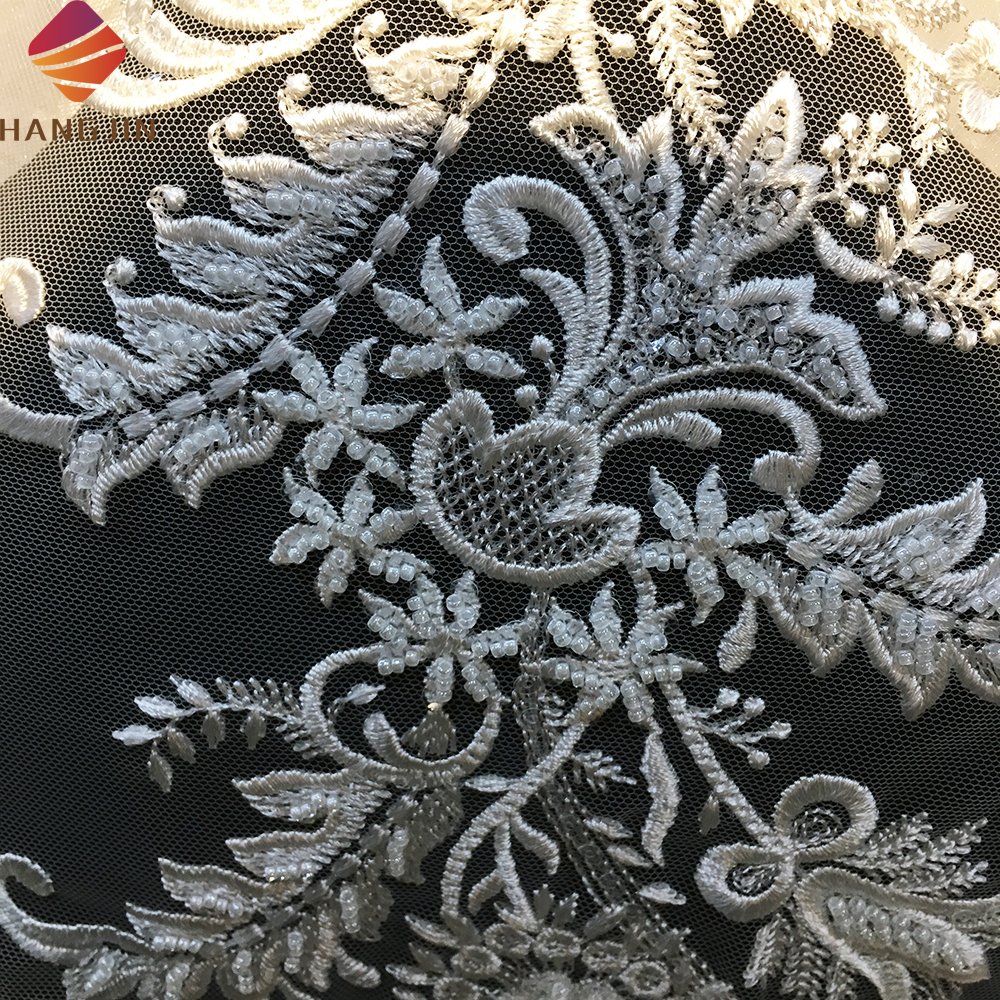 New Arrival Bridal Lace Fabric Luxury Sequin Beaded Guipure Lace Fabric Embroidery Tulle Net Fabric Sell By Yard