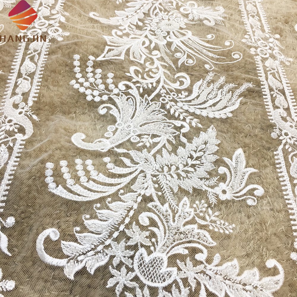 New Arrival Bridal Lace Fabric Luxury Sequin Beaded Guipure Lace Fabric Embroidery Tulle Net Fabric Sell By Yard