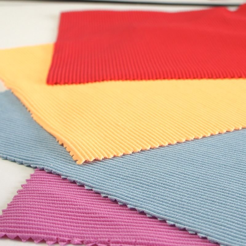 wholesale stock 85/15 nylon spandex 4 way stretch ribbed swimwear fabric