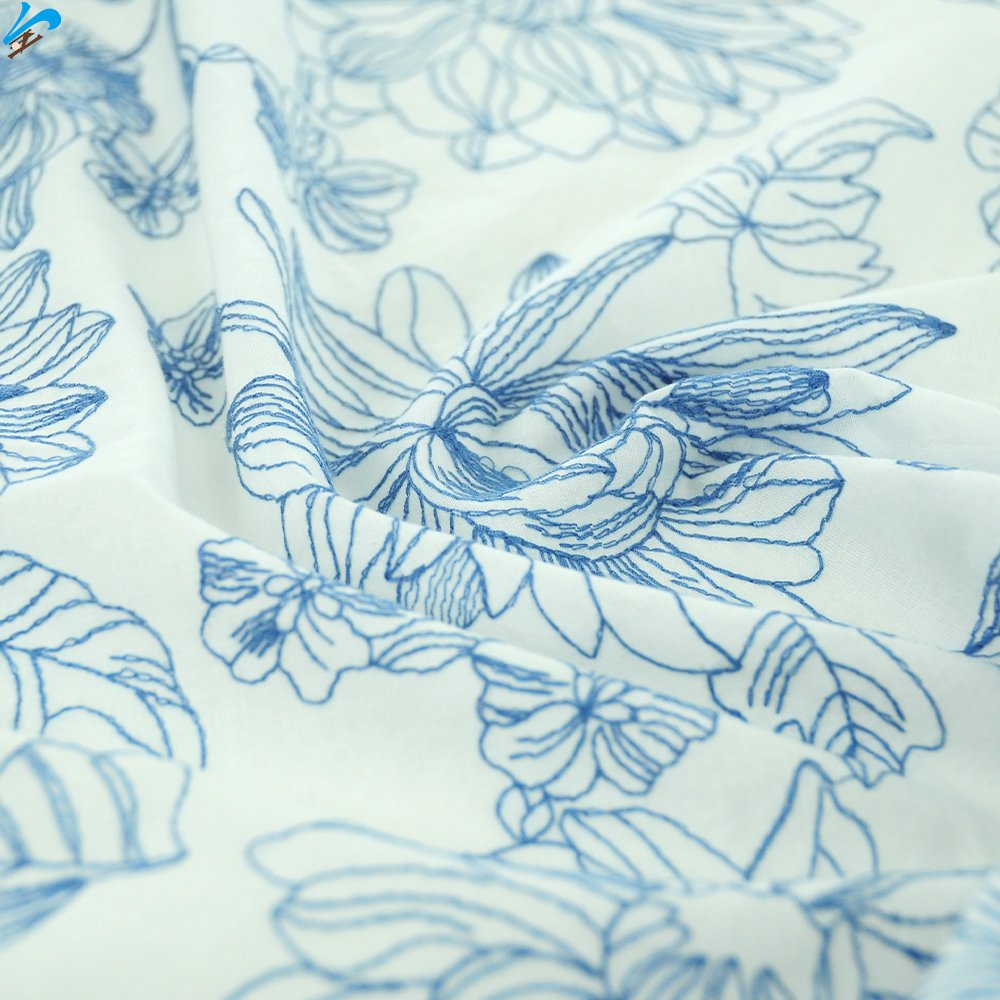 White Cotton Voile With Blue Embroidery Threads Breathable Floral Pattern Cotton Embroidery Fabric For Woman Apparel Garment