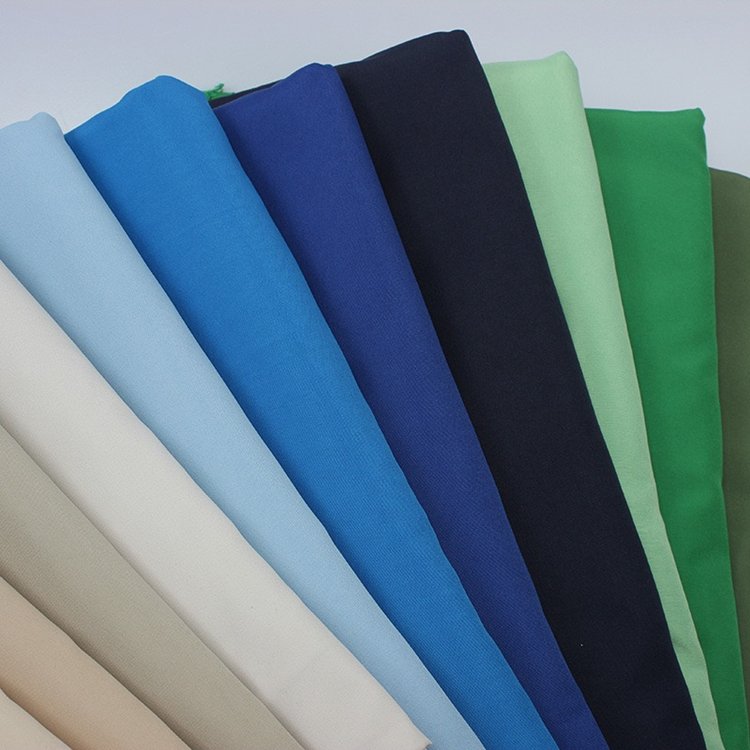 Factory direct sale 75D*150D peachskin fabric free sample outdoor casual pants fabric polyester peach skin fabric
