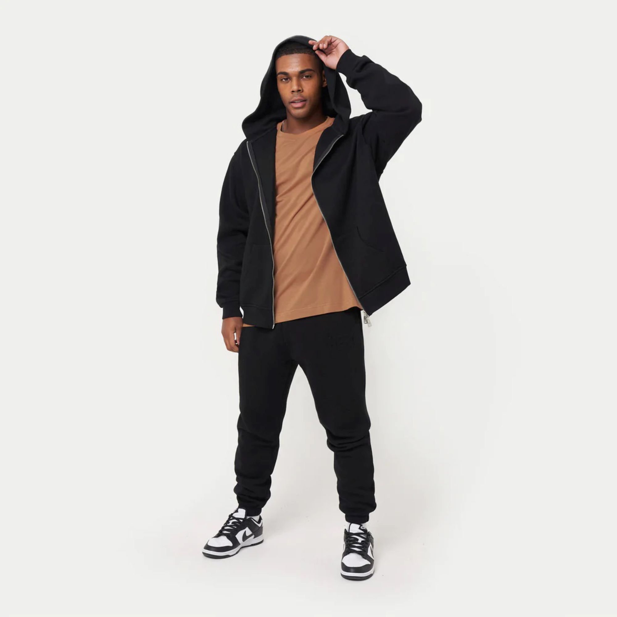 80% Cotton 20% Polyester Dropped shoulders Zip-front style Kangaroo Pockets Ribbed hem and cuffs Mustard Brown Oversized Hoodie