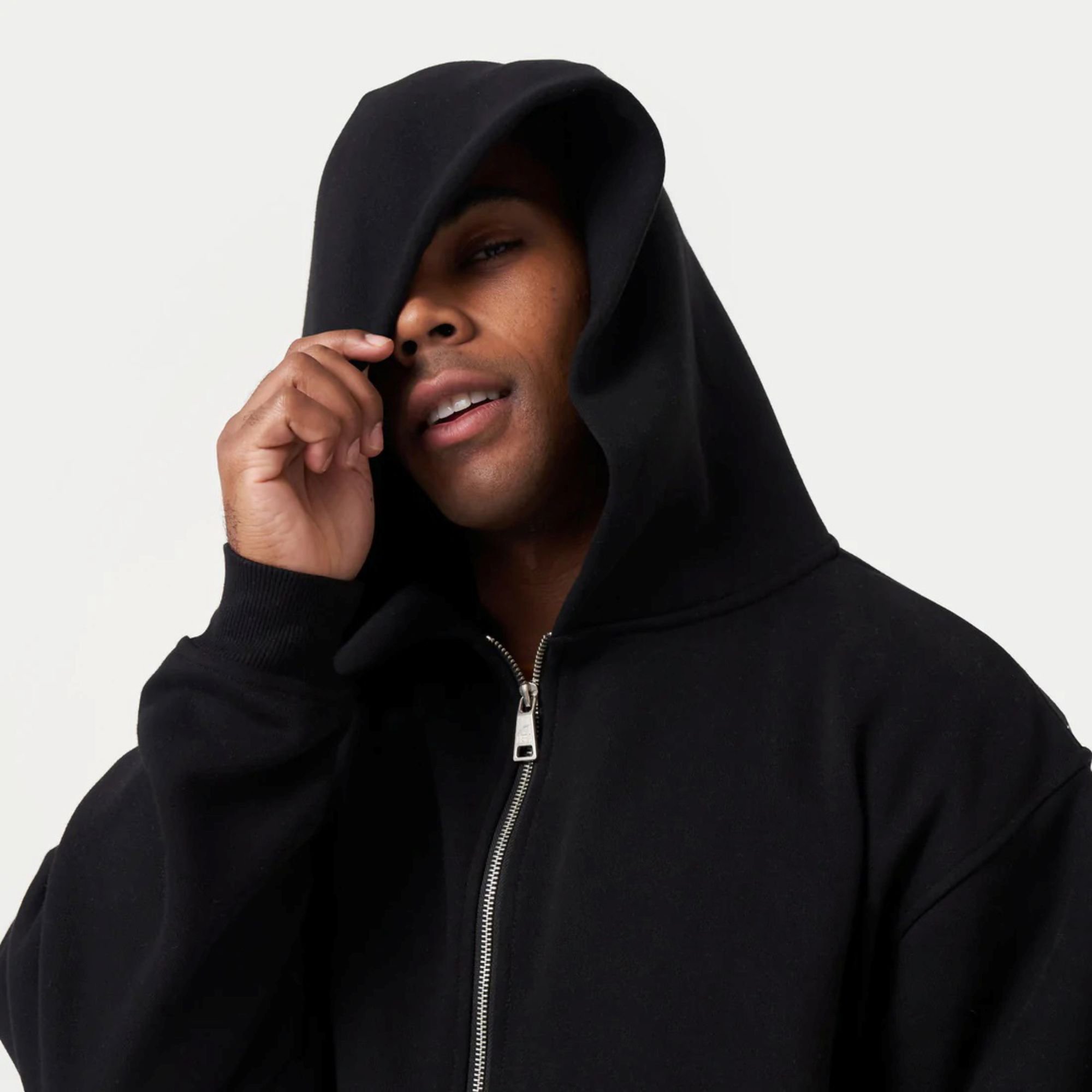 80% Cotton 20% Polyester Dropped shoulders Zip-front style Kangaroo Pockets Ribbed hem and cuffs Mustard Brown Oversized Hoodie