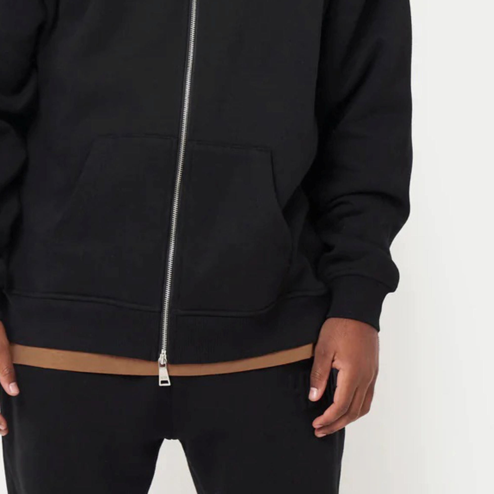 80% Cotton 20% Polyester Dropped shoulders Zip-front style Kangaroo Pockets Ribbed hem and cuffs Mustard Brown Oversized Hoodie
