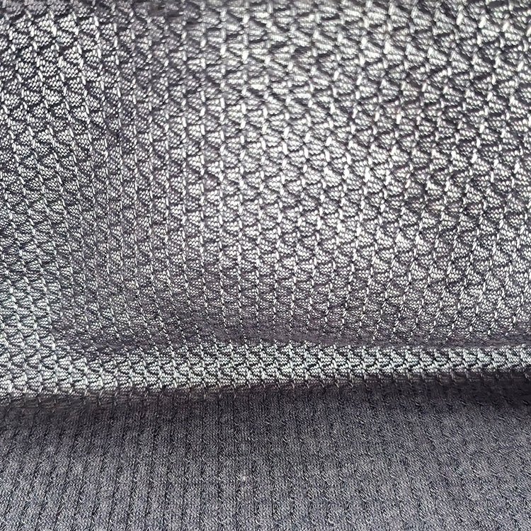 Wholesale knit breathable gray 64%polyester 34%rayon 3%spandex cross ribbed waffle honeycomb fabric for garment