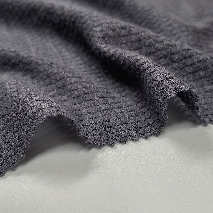 Wholesale knit breathable gray 64%polyester 34%rayon 3%spandex cross ribbed waffle honeycomb fabric for garment