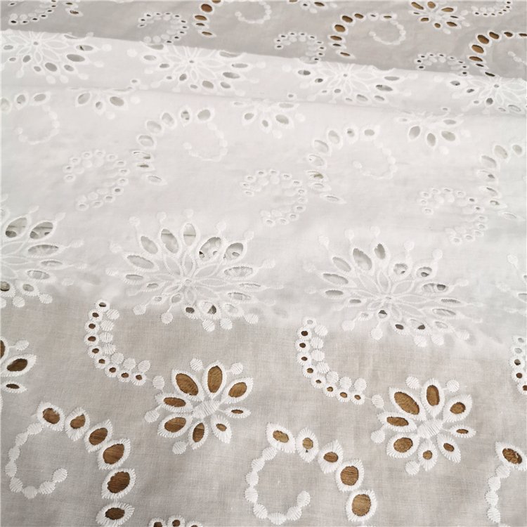 Hot selling low price leftover cotton embroidery fabric in stock lot for women and baby clothing