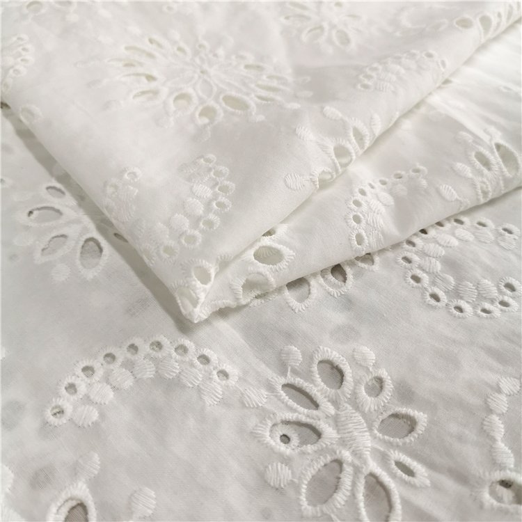 Hot selling low price leftover cotton embroidery fabric in stock lot for women and baby clothing