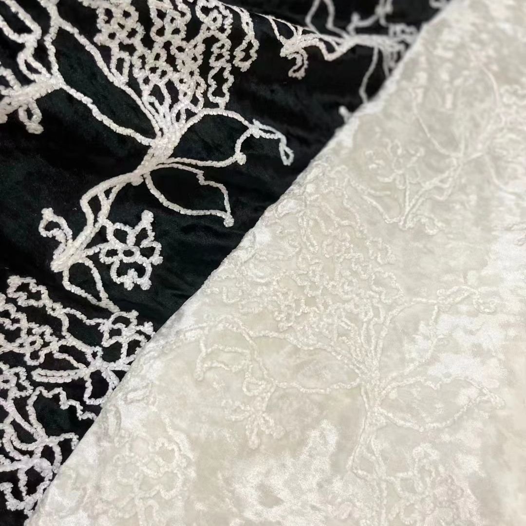 Nais luxury new pattern thick polyester white embroidered embossed 3d floral pattern velvet black fabrics for winter clothing