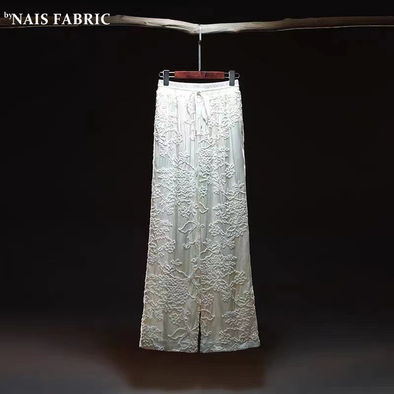 Nais luxury new pattern thick polyester white embroidered embossed 3d floral pattern velvet black fabrics for winter clothing