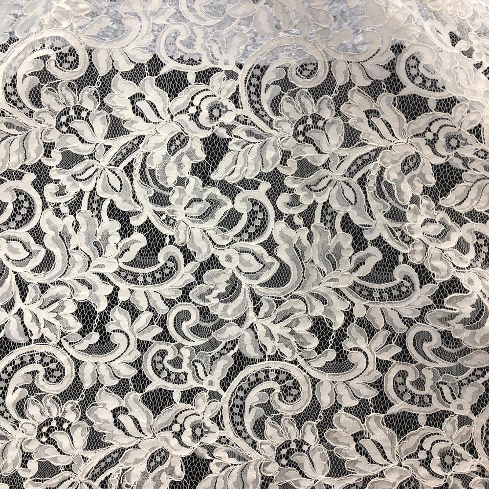 Wholesale embroidery white guipure heavy lace fabric 100% nylon vintage wedding curtain fabric with cording
