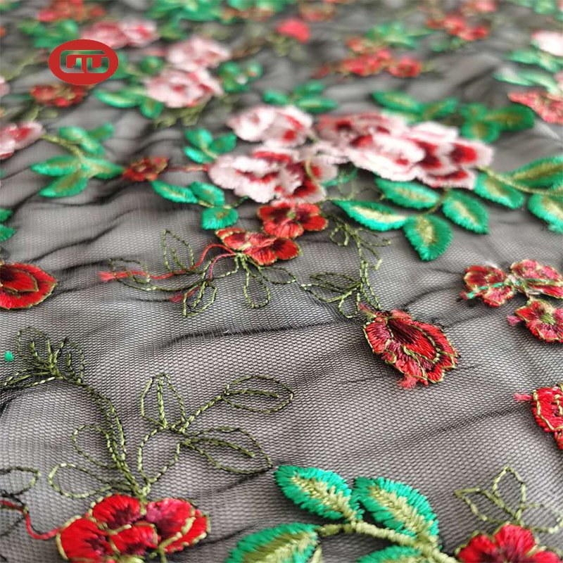 High fashion custom colorful flowers floral flat embroidery tulle mesh fabric for ladies dress