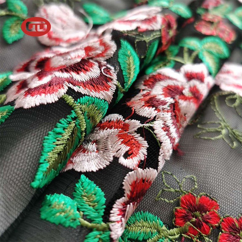 High fashion custom colorful flowers floral flat embroidery tulle mesh fabric for ladies dress