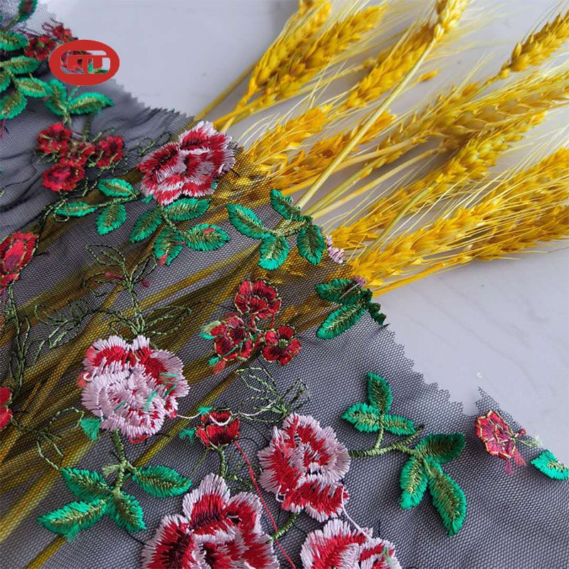 High fashion custom colorful flowers floral flat embroidery tulle mesh fabric for ladies dress
