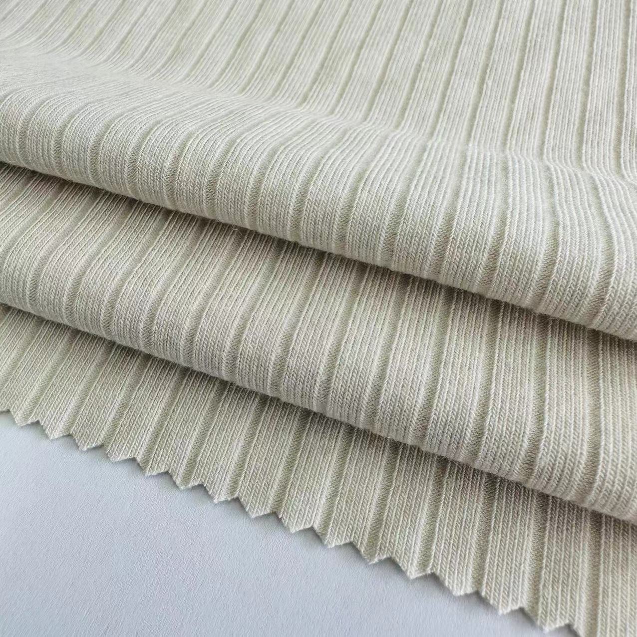 Wholesale solid colors 61% polyester 33% viscose 6% spandex TR stretch rib knit fabric for sweater and dress