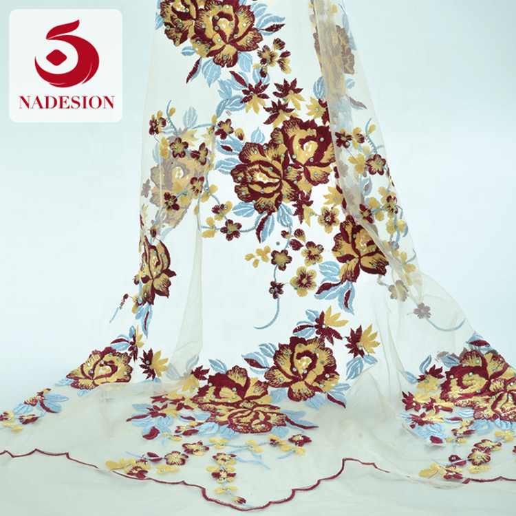 Hot selling fancy design stone embroidery design/schiffli embroidery fabrics