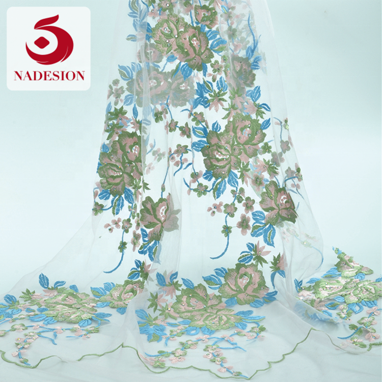Hot selling fancy design stone embroidery design/schiffli embroidery fabrics