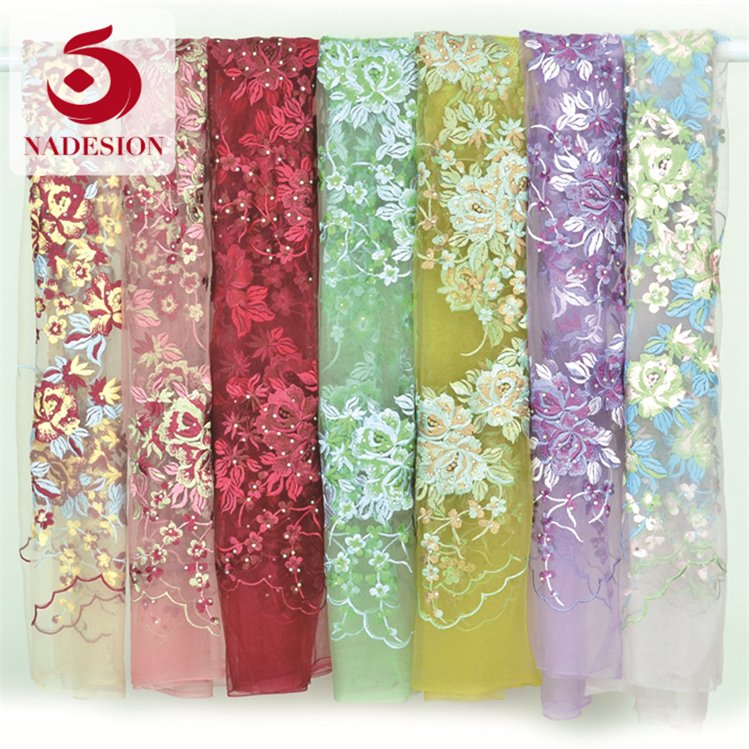 Hot selling fancy design stone embroidery design/schiffli embroidery fabrics