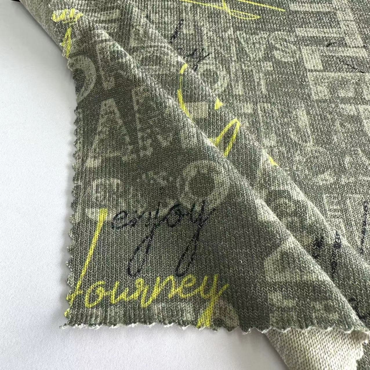 custom design Polyester Rayon Spandex knitted garment fabric TR stretchy printed hacci fabric for women sweater