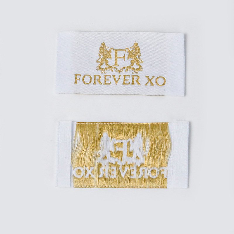 Custom Garment Rubber Embossed Logo on Woven Label Iron On 3D Silicone Printing Rubber Labels For Clothing
