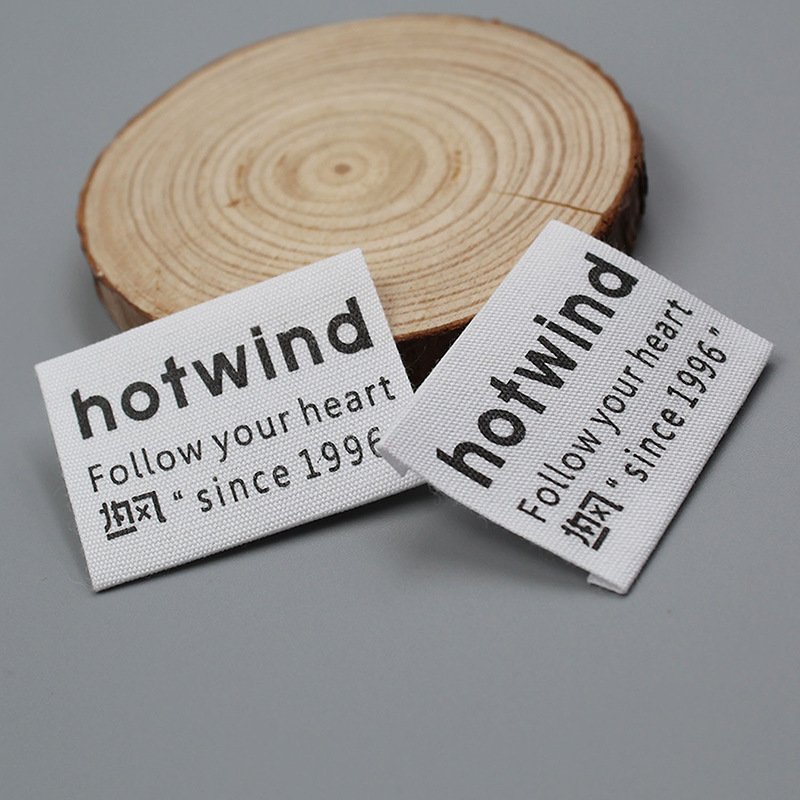 Custom Garment Rubber Embossed Logo on Woven Label Iron On 3D Silicone Printing Rubber Labels For Clothing