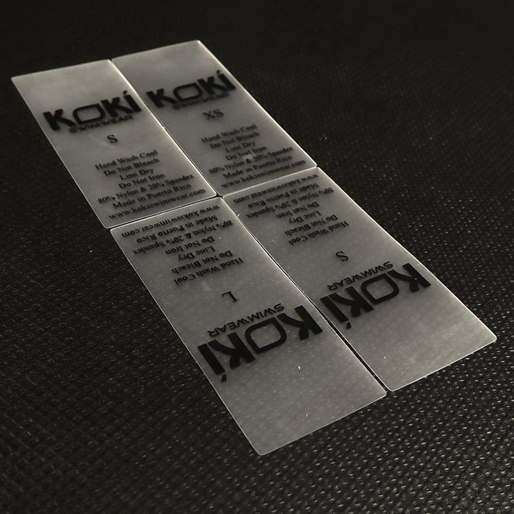 TPU Tags with Brand Name Logo Transparent Label Printing Washing Care Labels for Swimmingwear Tpu Logo Heat Transfer Tpu Label