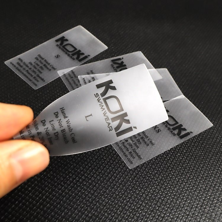 TPU Tags with Brand Name Logo Transparent Label Printing Washing Care Labels for Swimmingwear Tpu Logo Heat Transfer Tpu Label