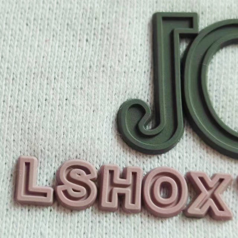 Wholesale customized letter pattern combination garment logo heat transfer silicone 3D relief grinding tool label for T-shirts