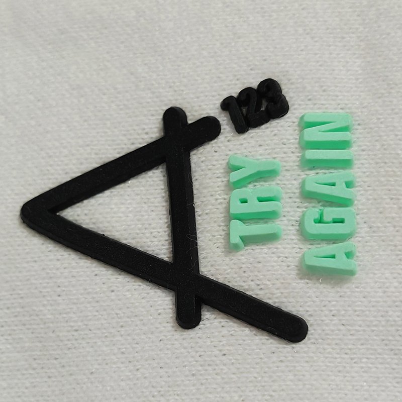 Wholesale customized letter pattern combination garment logo heat transfer silicone 3D relief grinding tool label for T-shirts