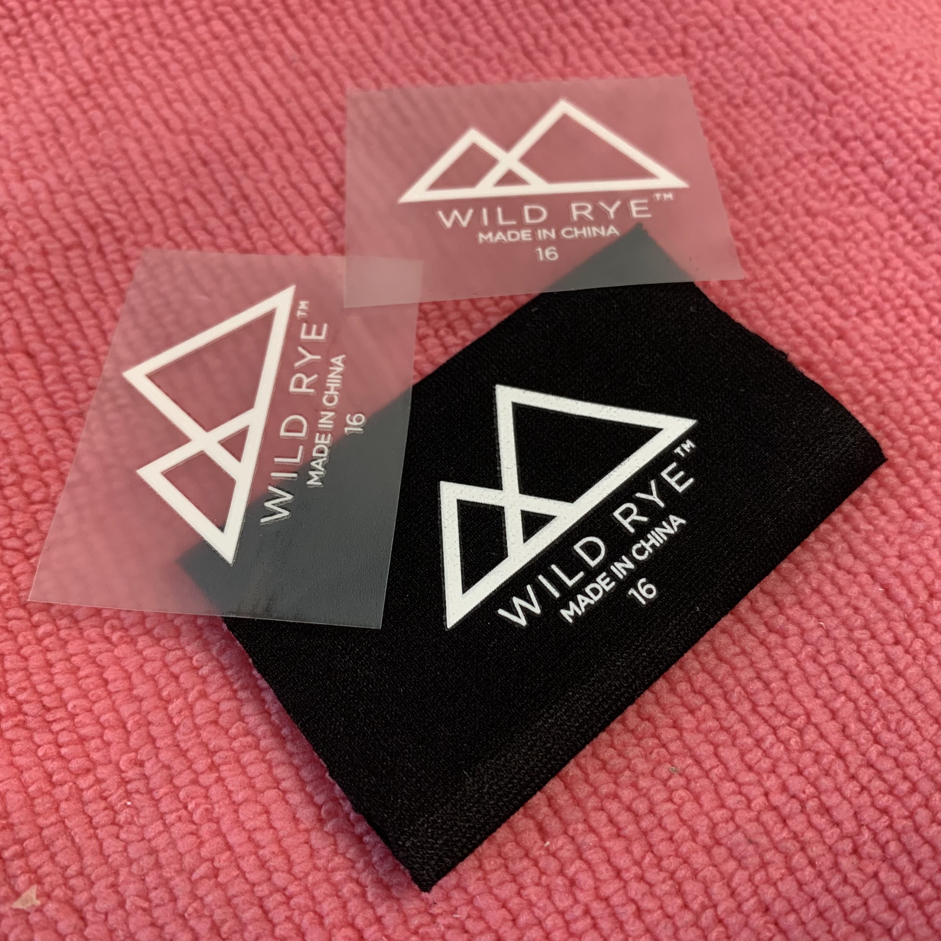 Low quantity tagless neck heat transfer label for shorts,washing vinyl film heat press clothing label for scarf