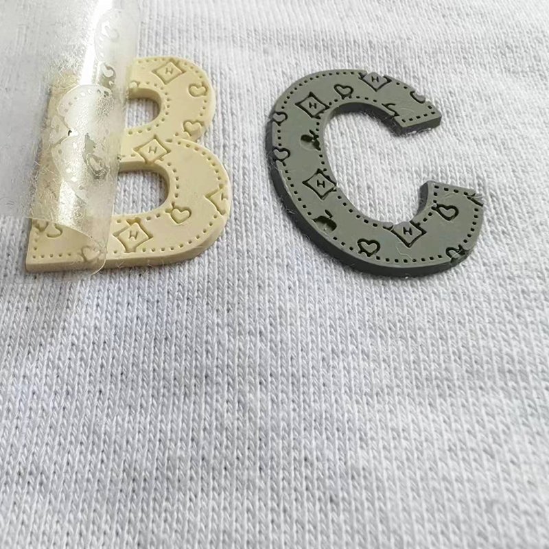 Luxury Silicon Care Label For Garment Logo Silicone Tag Heat Transfer Raised Sticker 3d Rubber Fashion With 3m Satin For Leather