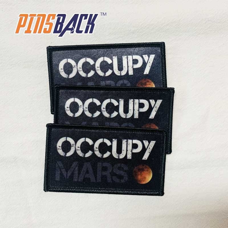 Best selling digital custom sublimated heat transfer print embroidery patch woven label over-lock edge patch manufacturer