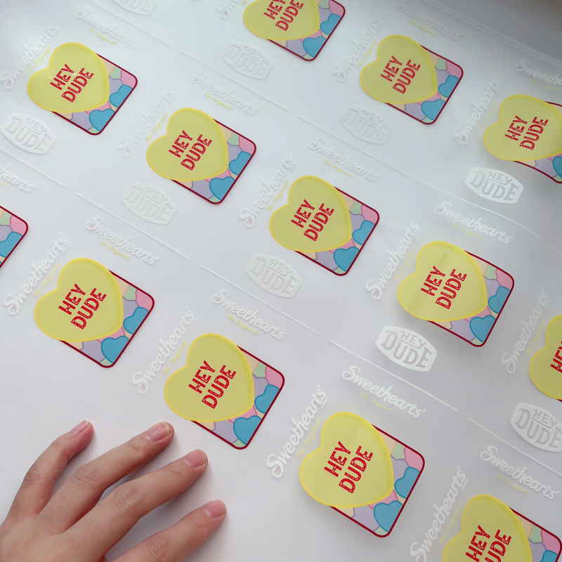 Wholesale factory low MOQ customized logo plastisol heat transfer dtf film iron on cloth transfers print for t-shirt