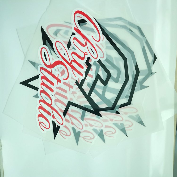 XinHeng Wholesale Fashion Plastisol Print Sheet Stickers Custom Heat DTF Transfer Film for T-shirt Transfer Printing