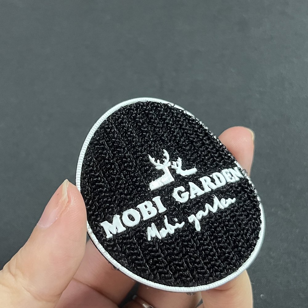 High Quality China Factory Maker Custom Printing 3D Embossed Silicone Logo Heat Transfer Label for Clothing Accessories