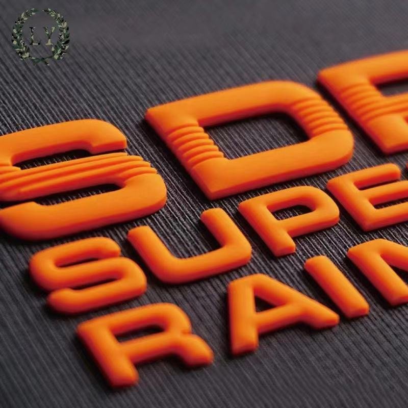 Custom embossed 3D raised logo TPU and silicone heat transfer label hot press molding